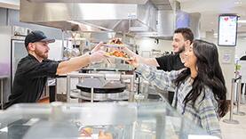 Students ordering food in the SNHU Dining Hall