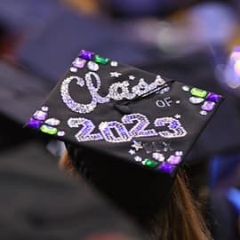 A decorated graduation cap that says Class of 2023