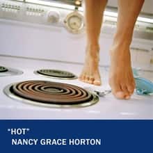 A woman standing on a white stovetop with only her toes showing with the text "Hot" Nancy Grace Horton