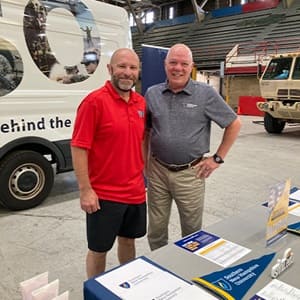 Michael Shimkus next to Chris McCollor at a USO event