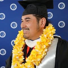 West Liua '23, general studies graduate from SNHU.