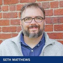 Seth Matthews and the text Seth Matthews.