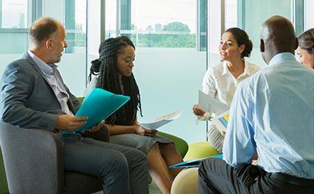 A group of people at a business meeting