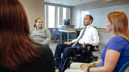 Students participating in a group session as part of their clinical mental health counseling residency.