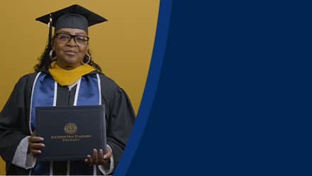 Cynthia Preston dressed in a graduation cap and gown after earning her bachelor's in marketing at SNHU in 2026.