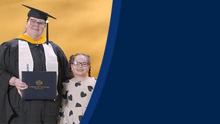 Jessica Yonice Vazquez, a 2024 graduate who earned her master’s in human resource management at SNHU standing with her daughter.