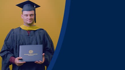 Luke Blaeser, a 2025 SNHU grad who earned his master's in healthcare administration holding his diploma in front of a yellow background.