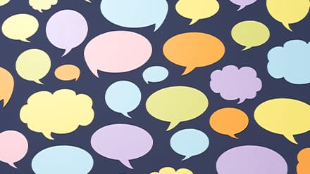 A bunch of multi-colored speech bubbles representing personal growth quotes