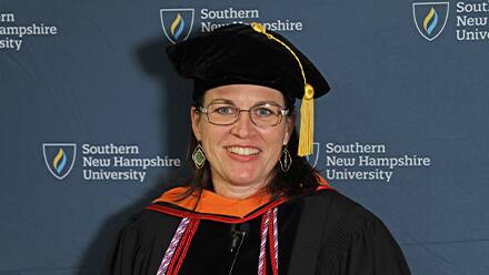 SNHU director of nursing compliance and licensure Dr. Sonya Blevins wearing a cap and gown at SNHU's commencement.
