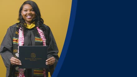 Triniti Adams '25, BS in Public Health grad from SNHU, holding a diploma.