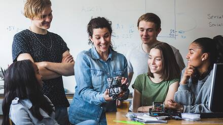 A teacher shows students what STEM means in education