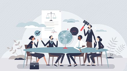 Animated professionals gathered around a globe at a conference table.