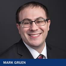 Mark Gruen with the text Mark Gruen
