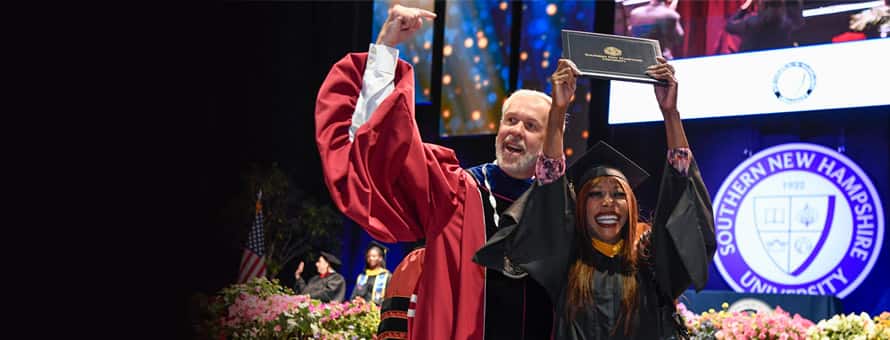 Paul LeBlanc with an SNHU grad at commencement