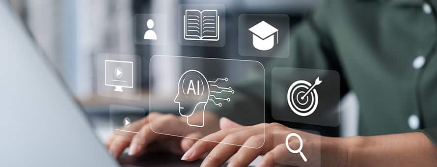 Two hands typing on a laptop with transparent icons depicting artificial intelligence, a book, graduation cap, bullseye target, magnifying glass, play buttons and a person.