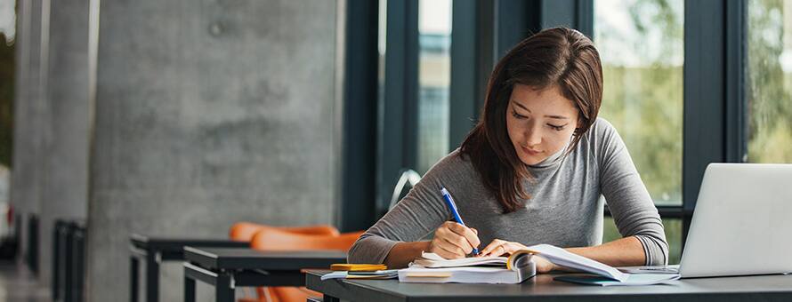 Student studying in the library.