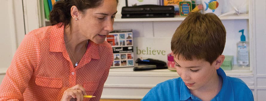 Dyslexia teacher working with a student