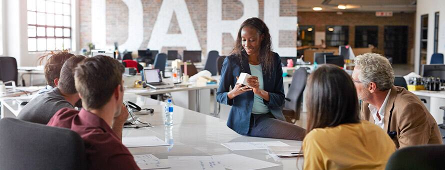 Members of a marketing team discussing a product campaign.