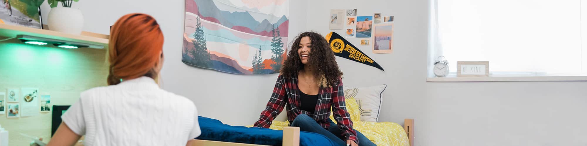 Two SNHU students in a dorm room