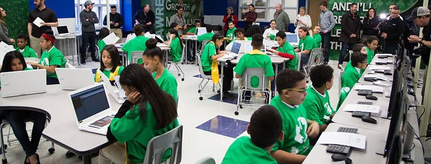 Students of Guilmette Middle School sitting in their newly unveiled tech lab