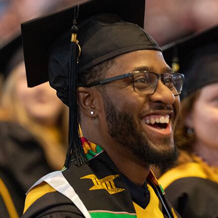 Matthew Seawright in his cap and gown at SNHU's Commencement.