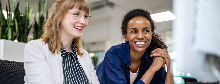 Healthcare professionals discussing how online medical billing and coding courses are worth it