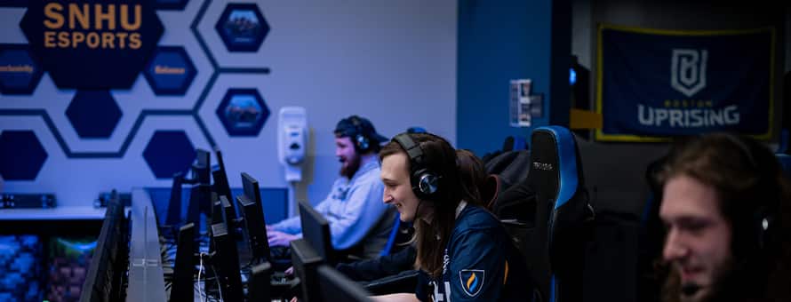 Members of SNHU's esports team playing during the SNHU x USO military gaming tournament.
