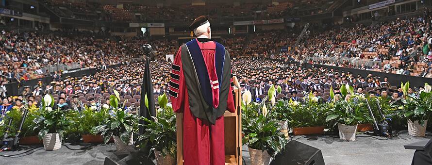 SNHU President Dr. Paul J. LeBlanc making a commencement address at the SNHU Arena.