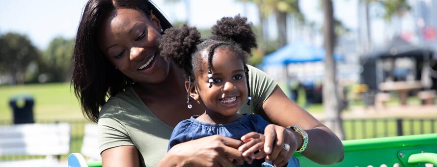 Mother and child play and show the power of kindness