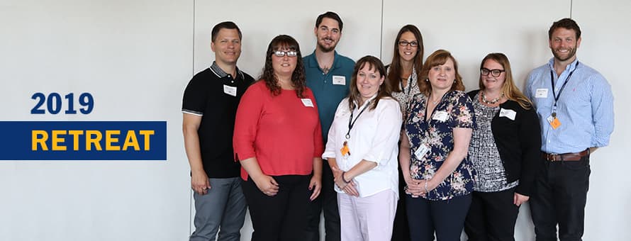 Student Advisory Board members Anthony Rhodes, Marjorie Dyksinski, Matthew Moody, Kristine Ducote, Stacee Helms, Tina Bedore, Megan McKinney and Benjamin Hulfeld and the text 2019 Retreat.