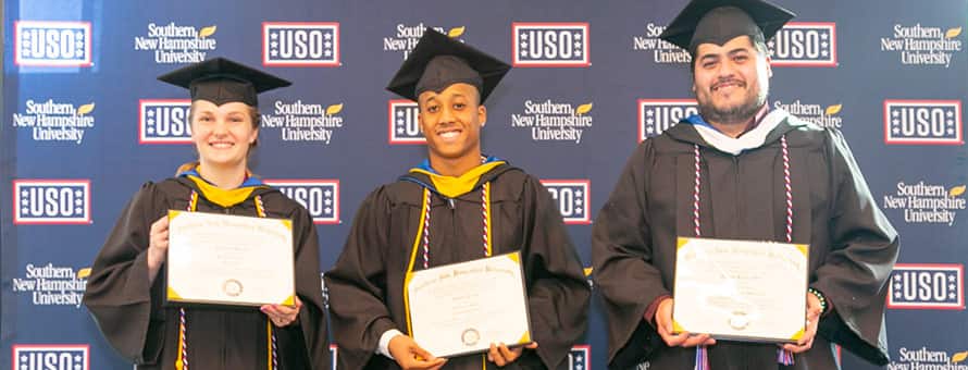 Adrianna Buxrude, Anthony Powell and Juvenal Rivera III with their diplomas