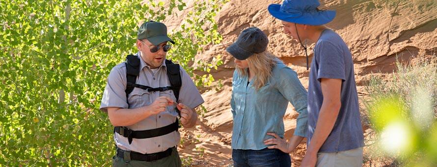Two men and a woman working on Geoscience research