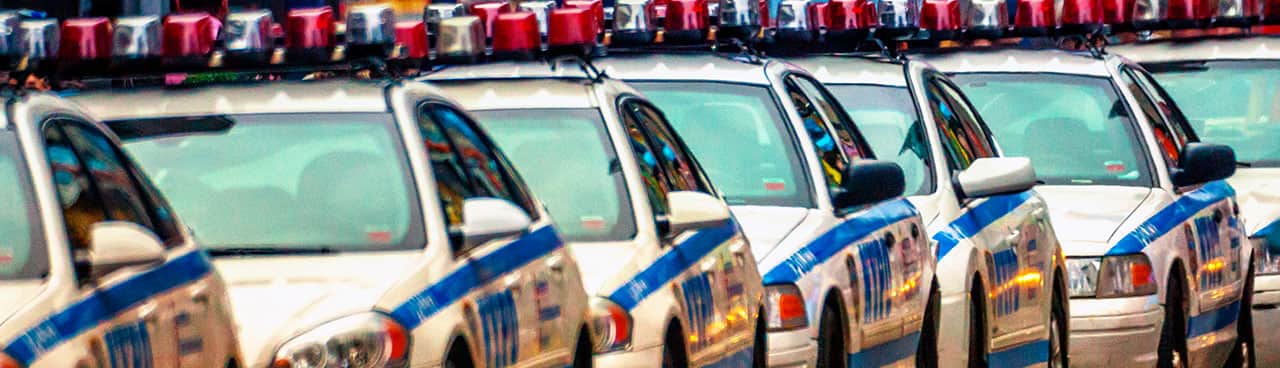 New York Police Department cars lined up in row.