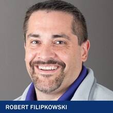 Robert Filipkowski with the text Robert Filipkowski