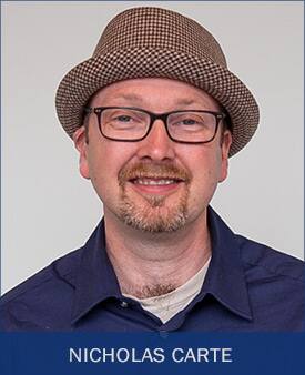 Dr. Nicholas Carte, wearing a hat and a blue polo shirt.