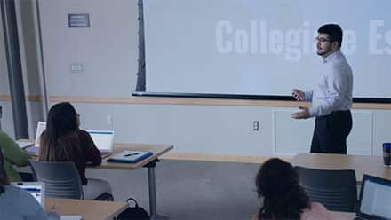 An education student talking to a classroom