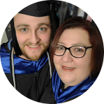 Tara Conrad and her son George Conrad, SNHU graduates and Pennsylvania residents, smiling and wearing their cap and gowns